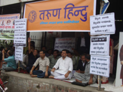 Members of various Hindu Orgs. during a protest against atrocities on Hindus In Assam
